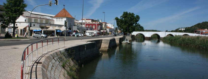 The River Arade glides through Silves town center